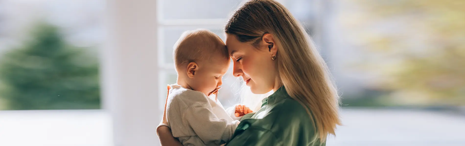 Embracing Motherhood: Mother and Baby Share a Moment of Love